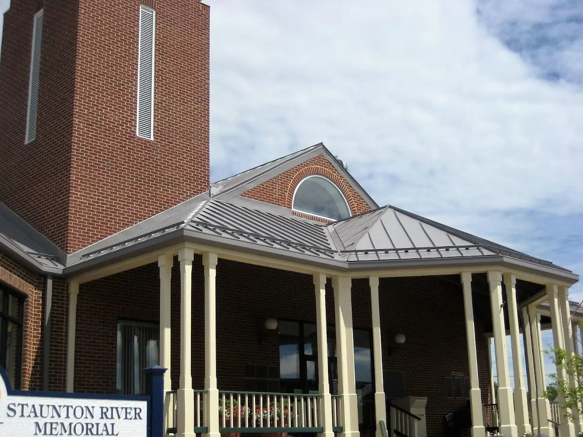 Skilled roofing craftsmen working on a residential roof in Wildrose Valley